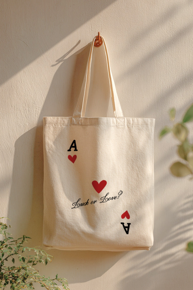 "luck or love" graphic canvas tote bag